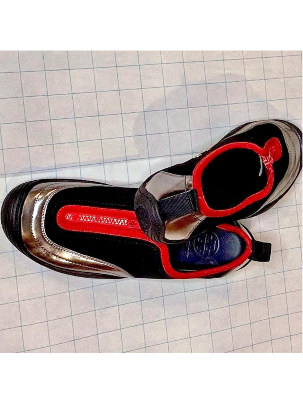 Tory Burch black & red slip-on sneakers with metallic silver accents #toryburch